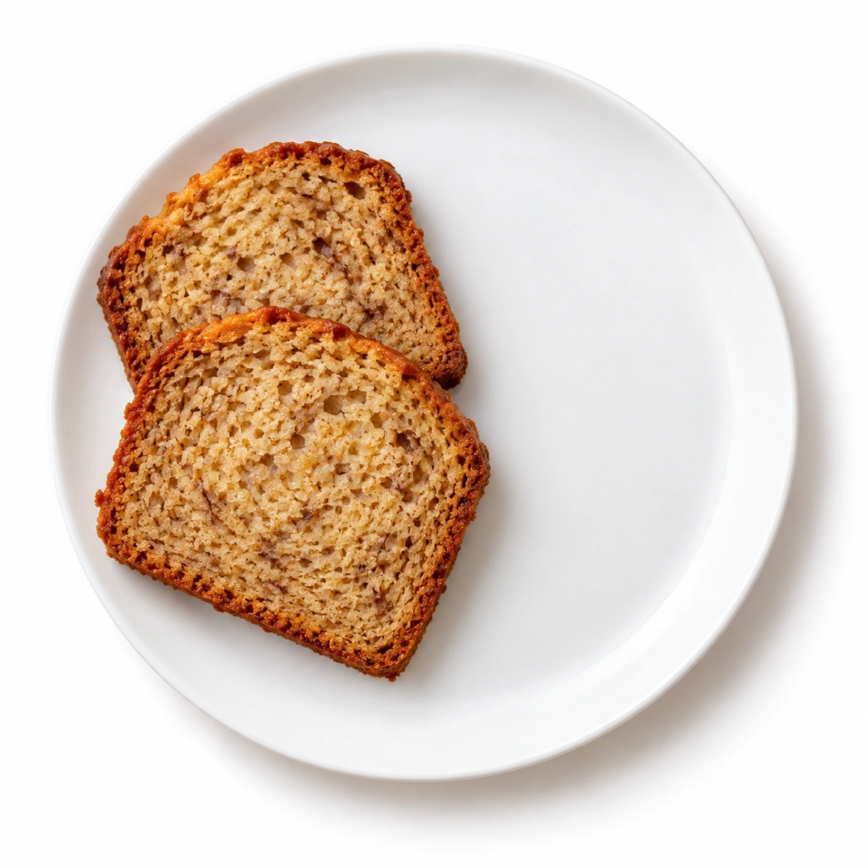 Bananenbrot auf einem weißen Teller.