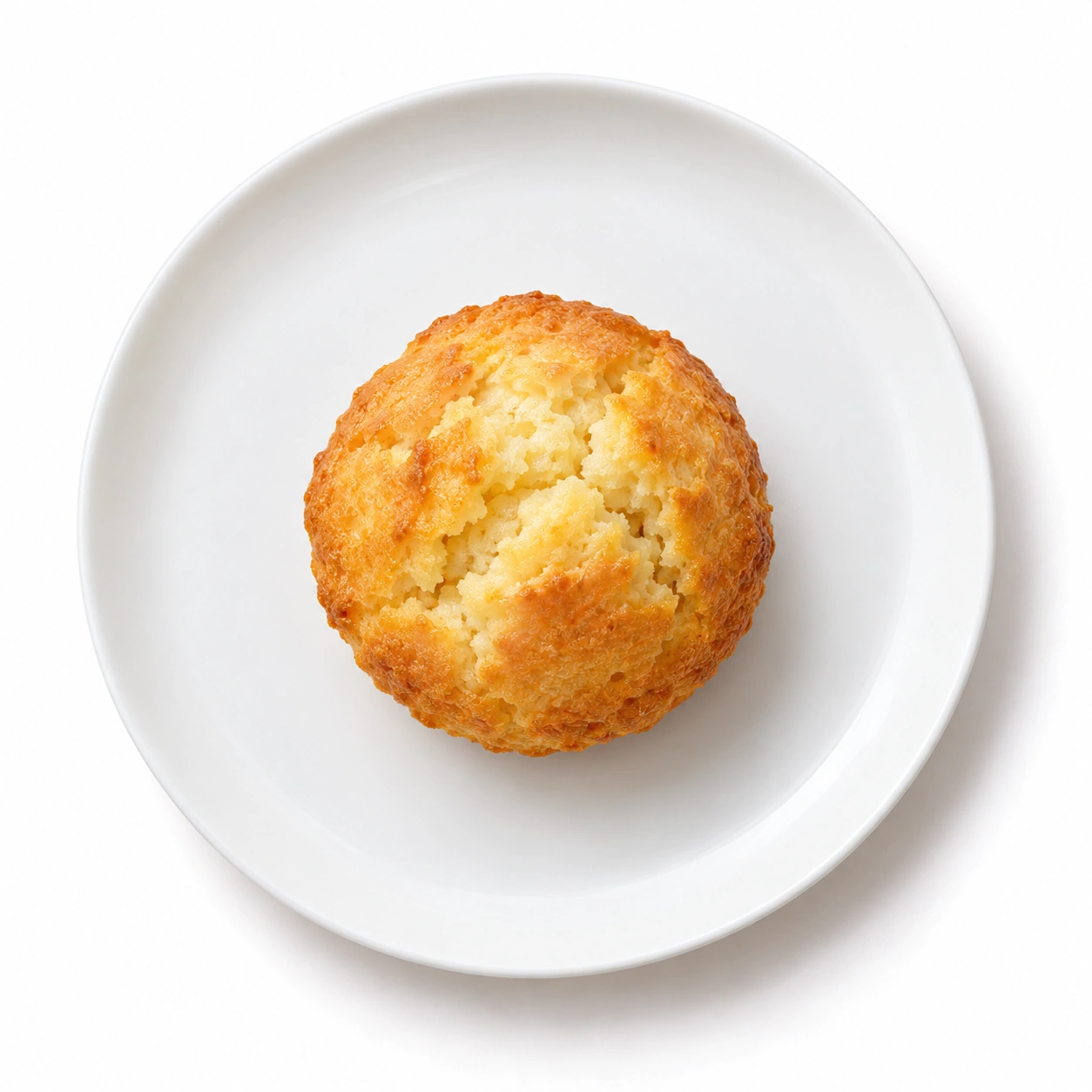 Muffin vor weißem Hintergrund.